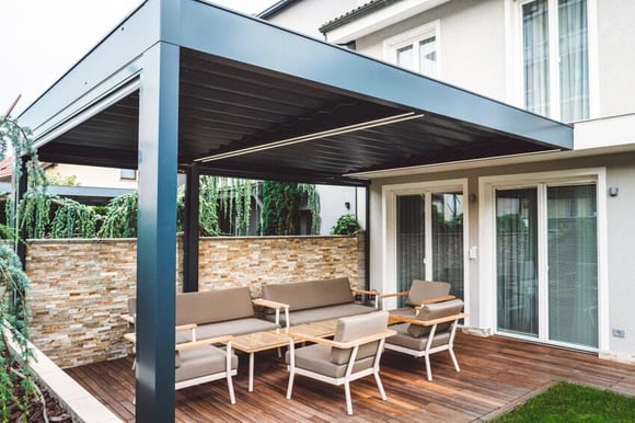 louvered-roof-pergola-with-outdoor-furniture-under-is