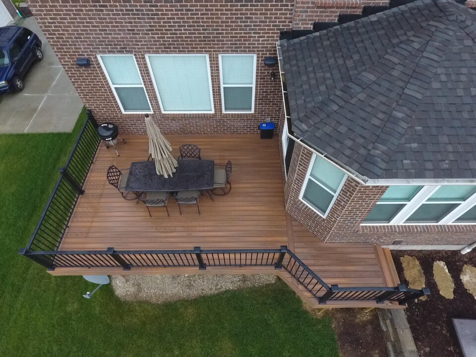 Outdoor Sitting Area With Chairs and Umbrella Top View