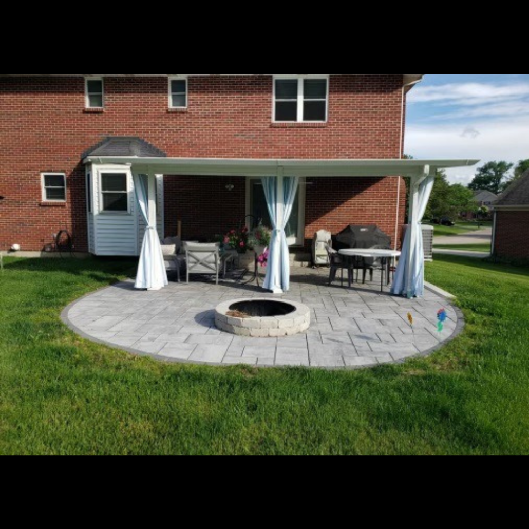 An Outdoor Shade With White Color Curtains