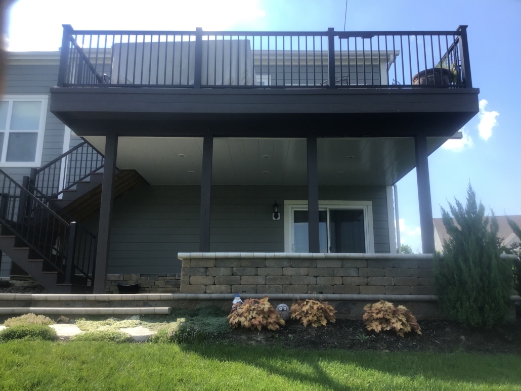 Lawn Infront of Building With Black Color Railing
